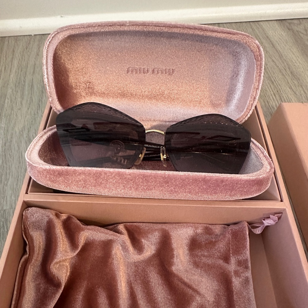 Never worn Miu Miu Sunglasses with charms